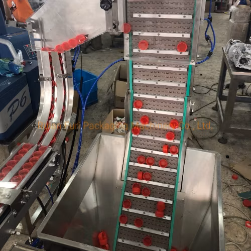 Máquina automática de ensamblaje de tapas de botellas